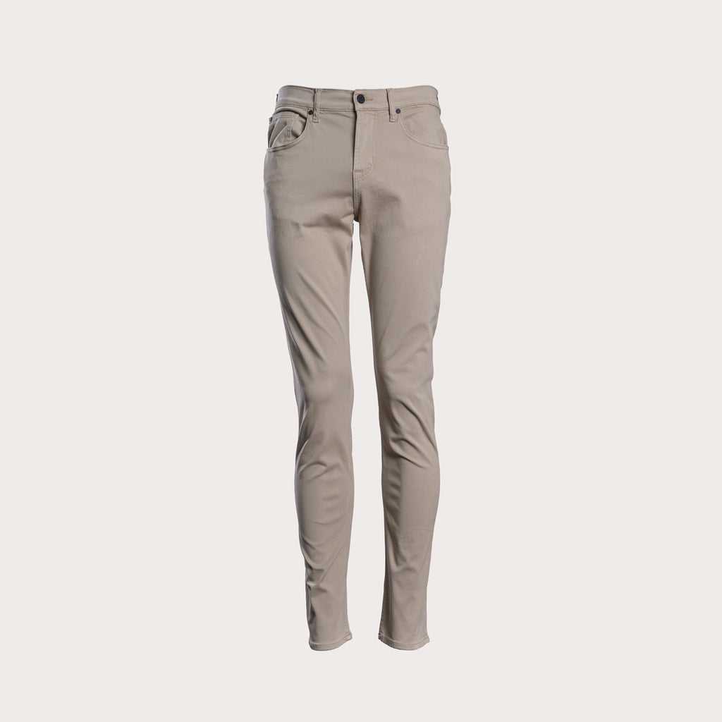 A pair of slim-fit, straight-leg pants in a light taupe-beige color, shown against a solid off-white background. 7 For All Mankind Slimmy Sateen Jeans. Sakks Menswear Southampton.