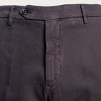 Close-up of dark charcoal gray trousers showing the waistband, button, belt loops, and front fly area. Briglia 1949 Trousers available at Sakks Menswear in Southampton.