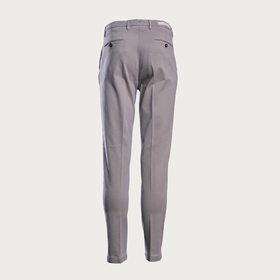 A pair of light gray slim-fit trousers shown from the back, featuring a buttoned waistband, belt loops, and two back pockets, set against a solid off-white background. Briglia 1949 Trousers available at Sakks Menswear in Southampton.