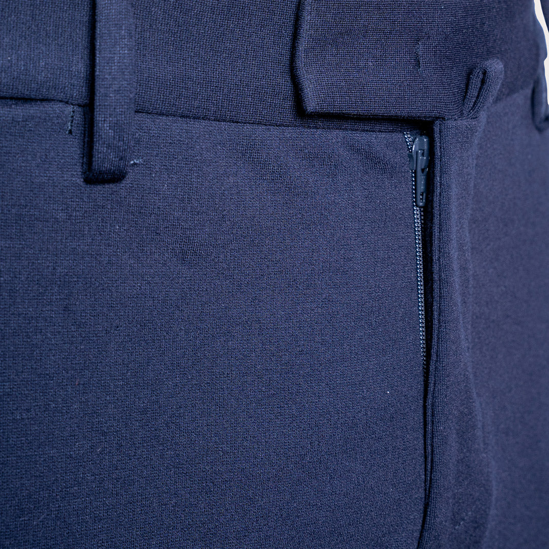 Close-up of dark navy blue trousers showing the fabric texture, belt loops, and a zippered pocket detail. Briglia 1949 Trousers available at Sakks Menswear in Southampton.