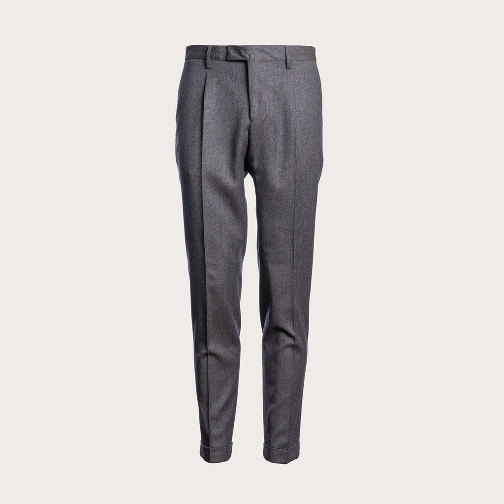 A pair of dark gray, slim-fit trousers with front pleats, shown against a solid light beige background. Briglia 1949 Trousers available at Sakks Menswear in Southampton.
