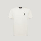 An off-white short-sleeve crewneck t-shirt with a small black embroidered logo on the left chest, displayed on a neutral light gray background. Belstaff T-Shirt. Sakks Menswear Southampton.