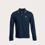 A navy blue long-sleeve polo shirt shown from the front, featuring a thin white stripe detail along the collar, set against a solid light beige background. Belstaff Long Sleeved Polo. Sakks Menswear Southampton.