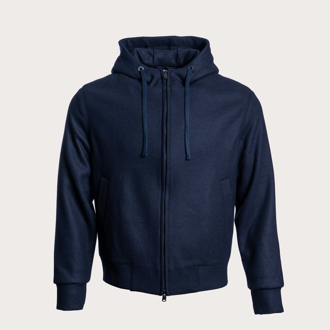 A navy blue zip-up hoodie with a drawstring hood and front pockets, displayed on a neutral light gray background. Circolo 1901 Hoodie available at Sakks Menswear in Southampton.