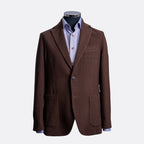 A brown textured blazer jacket displayed on a mannequin torso, layered over a light blue and white checkered dress shirt, against a plain light gray background. Circolo 1901 Blazer available at Sakks Menswear in Southampton.