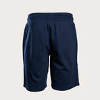 A pair of dark navy blue athletic shorts with an elastic waistband, shown from the back on a light beige background. Emporio Armani Shorts. Sakks Menswear Southampton.