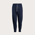 A pair of dark navy blue sweatpants with a white drawstring, shown against a light gray background. Emporio Armani Sweat Pants. Sakks Menswear Southampton.