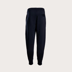 Dark navy blue sweatpants shown from the back, featuring a drawstring waistband, a side pocket, and ribbed cuffs, displayed on a light gray background. Emporio Armani Sweat Pants. Sakks Menswear Southampton.