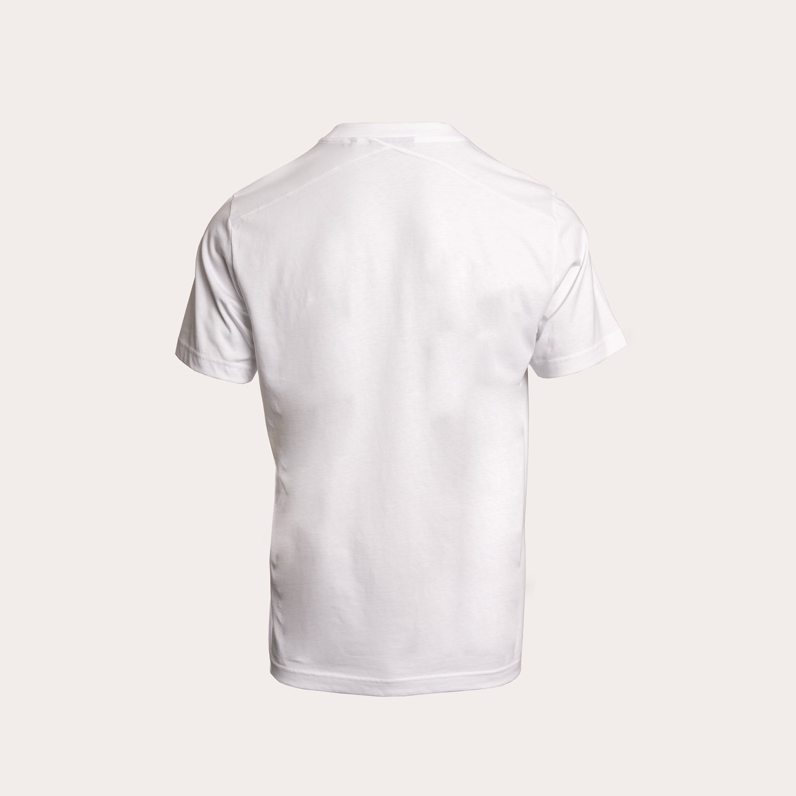 A white short-sleeve crewneck t-shirt shown from the back, displayed on a clean, solid, light beige background. MA.Strum T-Shirt available at Sakks Menswear in Southampton
