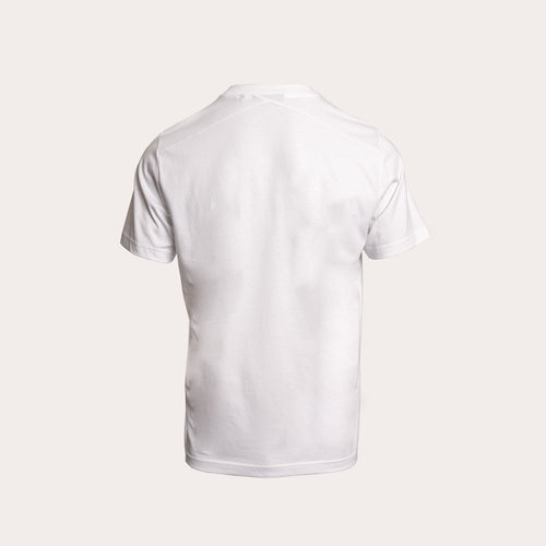 A white short-sleeve crewneck t-shirt shown from the back, displayed on a clean, solid, light beige background. MA.Strum T-Shirt available at Sakks Menswear in Southampton