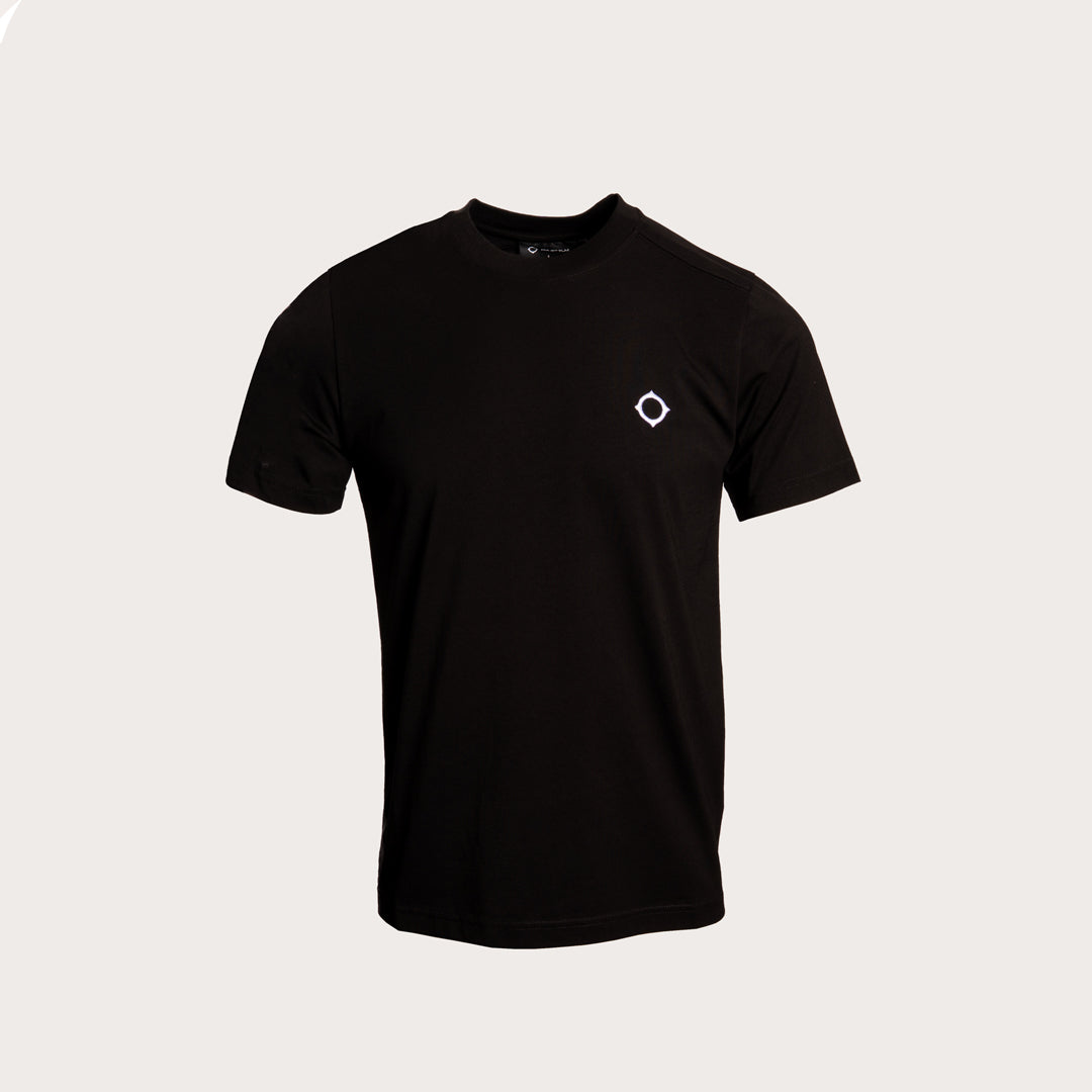 A black short-sleeve crewneck t-shirt with a small white geometric diamond logo on the left chest, displayed on a light gray background. MA.Strum T-Shirt available at Sakks Menswear in Southampton