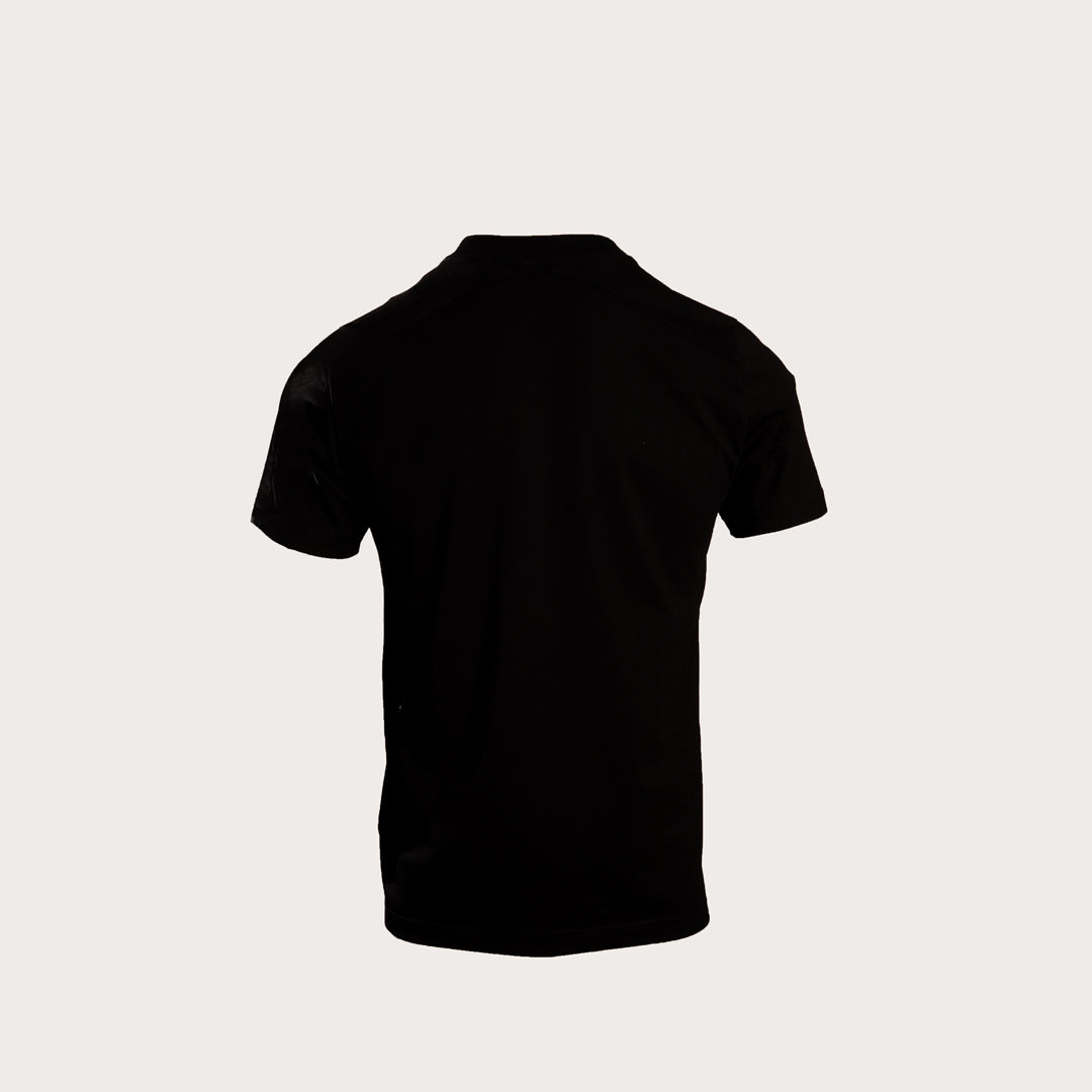 A black short-sleeve crewneck t-shirt shown from the back, centered on a light beige background. MA.Strum T-Shirt available at Sakks Menswear in Southampton