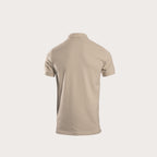 A short-sleeve polo shirt shown from the back, in a solid light beige color, displayed on a clean, solid off-white background. MA.Strum Polo available at Sakks Menswear in Southampton.