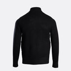 A black ribbed knit turtleneck sweater shown from the back on a light gray background. MA.Strum Hybrid Jacket available at Sakks Menswear in Southampton.