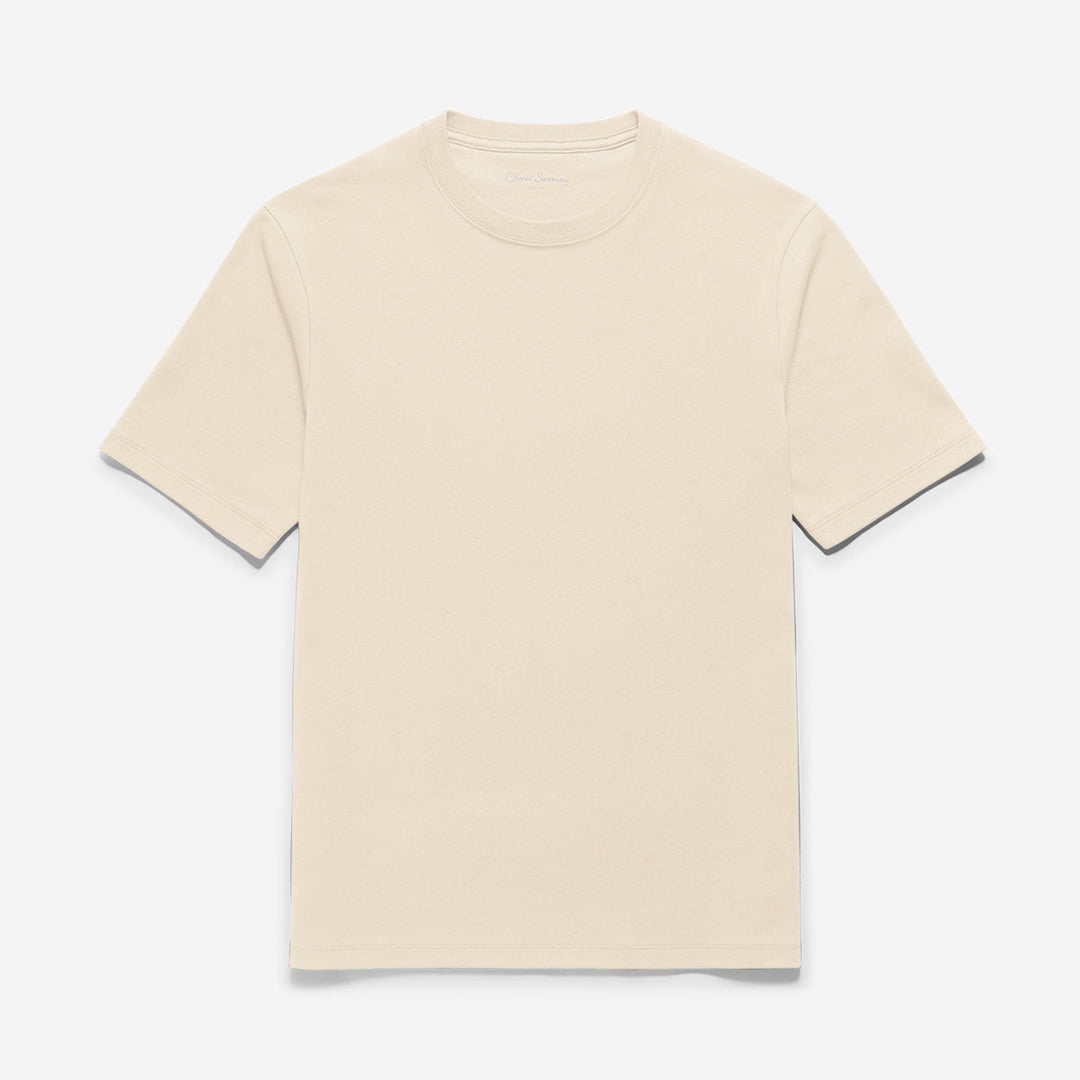 A short-sleeve crewneck t-shirt in a light cream or off-white color, shown flat against a very light gray background. Oliver Sweeney T-Shirt available at Sakks Menswear in Southampton