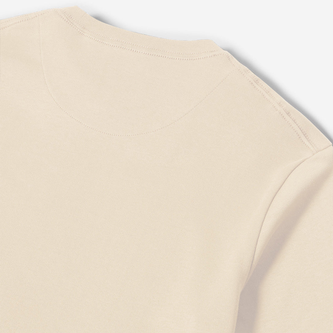 Beige shirt with a collar on a white background. Oliver Sweeney T-Shirt available at Sakks Menswear in Southampton