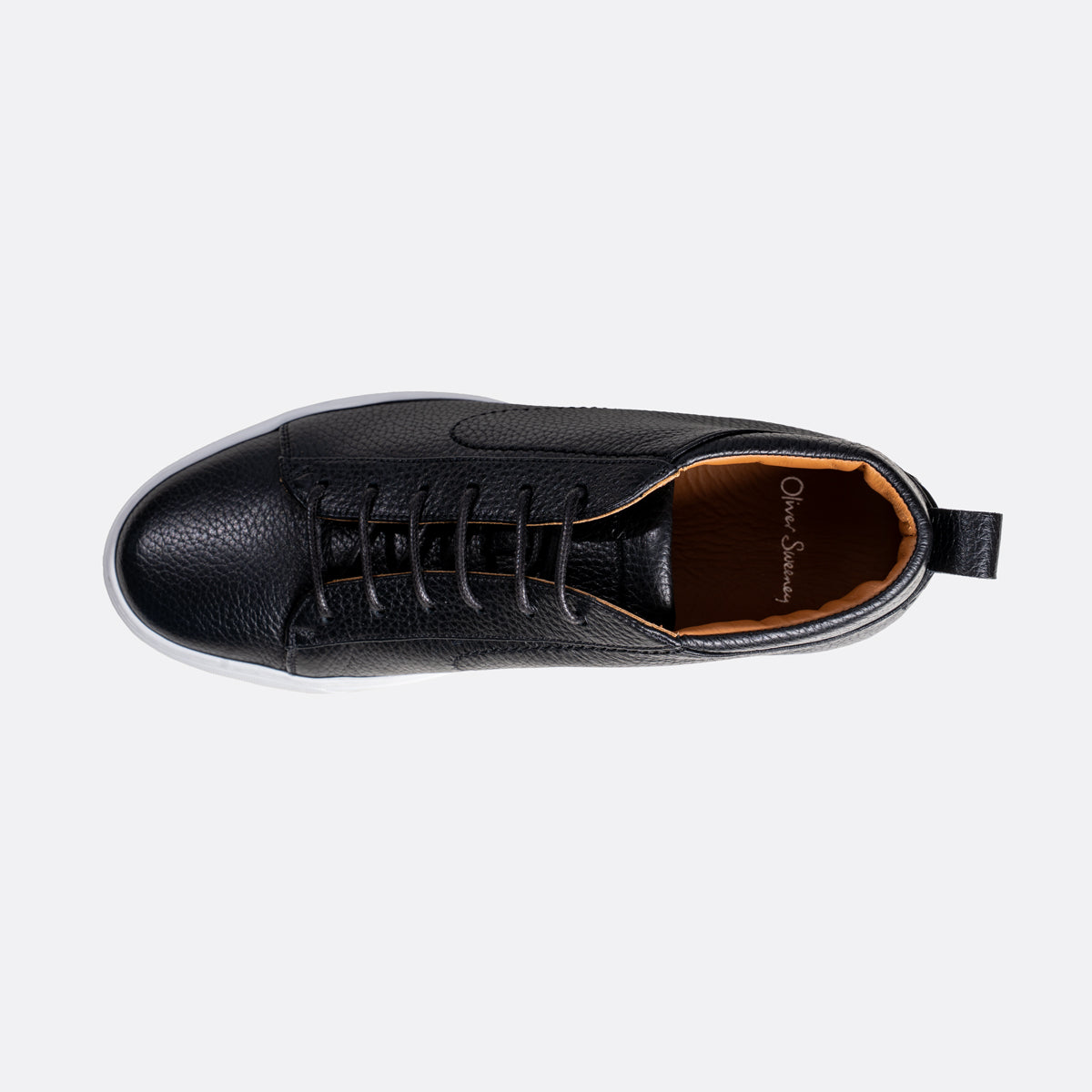 A black pebbled leather lace-up shoe shown from a top-down view against a light gray background. The shoe features a black pull tab on the heel and a visible 'One True Shoes' brand logo on the tan interior lining. Oliver Sweeney Sneakers available at Sakks Menswear in Southampton.