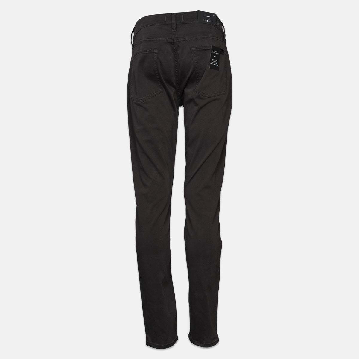 Black slim-fit jeans shown from the back, featuring a five-pocket design and a small black brand patch on the right pocket, set against a plain light gray background. 7 For All Mankind Chinos available at Sakks Menswear in Southampton.