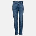 A pair of medium wash blue denim jeans shown flat against a light gray background. 7 For All Mankind jeans available at Sakks Menswear in Southampton.