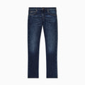 A pair of dark blue slim-fit jeans with subtle whiskering and fading on the thighs, shown flat against a light gray background. Emporio Armani Jeans available at Sakks Menswear in Southampton