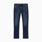 A pair of dark blue slim-fit jeans with subtle whiskering and fading on the thighs, shown flat against a light gray background. Emporio Armani Jeans available at Sakks Menswear in Southampton