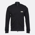 A black zip-up track jacket with a stand collar, featuring a small white rectangular chest logo with an eagle emblem, displayed on a light gray background. Emporio Armani Sweatshirt available at Sakks Menswear in Southampton.