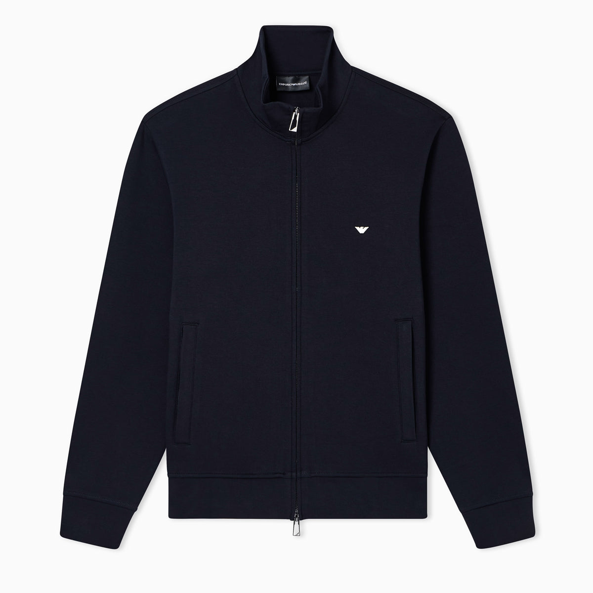 A dark navy blue zip-up jacket with a stand collar, featuring the embroidered Emporio Armani eagle logo on the left chest, displayed on a clean white background. Emporio Armani Sweatshirt available at Sakks Menswear in Southampton.