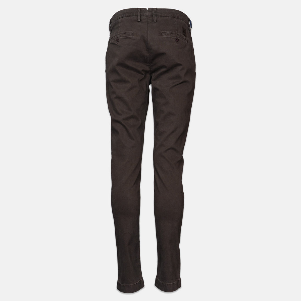 Dark brown slim-fit trousers shown from the back, featuring a button waistband, belt loops, and rear patch pockets, displayed on a light gray background. Jacob Cohen Trousers available at Sakks Menswear in Southampton.