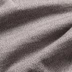 Close-up of a heather gray knit fabric texture with soft folds and visible woven detail. Oliver Sweeney Knitwear available at Sakks Menswear in Southampton.
