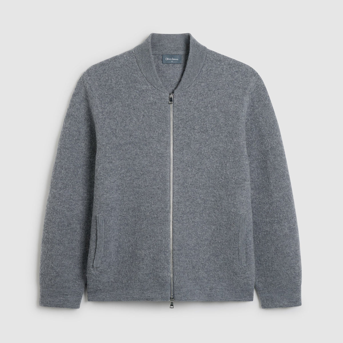 A gray zip-up knit cardigan sweater with a ribbed collar, displayed flat against a light gray background. Oliver Sweeney Cardigan available at Sakks Menswear in Southampton.