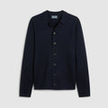Knitted navy merino wool blend overshirt lat laid on a light grey background. The overshirt is a button down closure. Oliver Sweeney cardigan available at Sakks Menswear in Southampton.