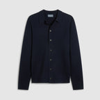 Knitted navy merino wool blend overshirt lat laid on a light grey background. The overshirt is a button down closure. Oliver Sweeney cardigan available at Sakks Menswear in Southampton.
