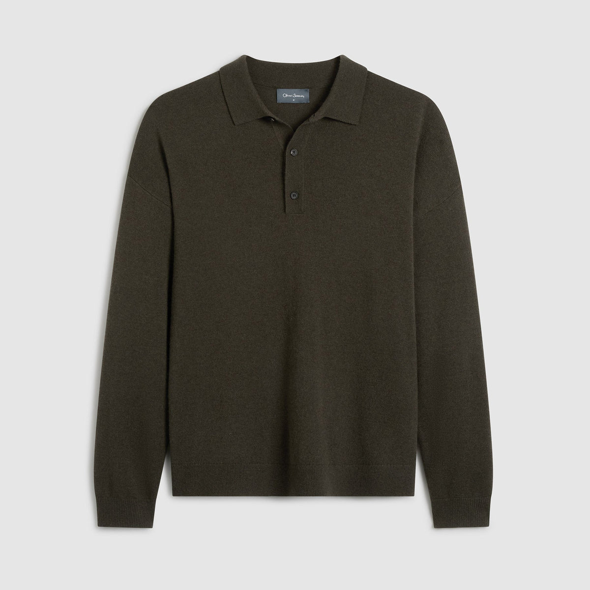 Green long sleeve knitted polo shirt laid flat on a light grey background. Features button up closure and a relaxed fit. Oliver Sweeney Knitwear available at Sakks Menswear in Southampton.
