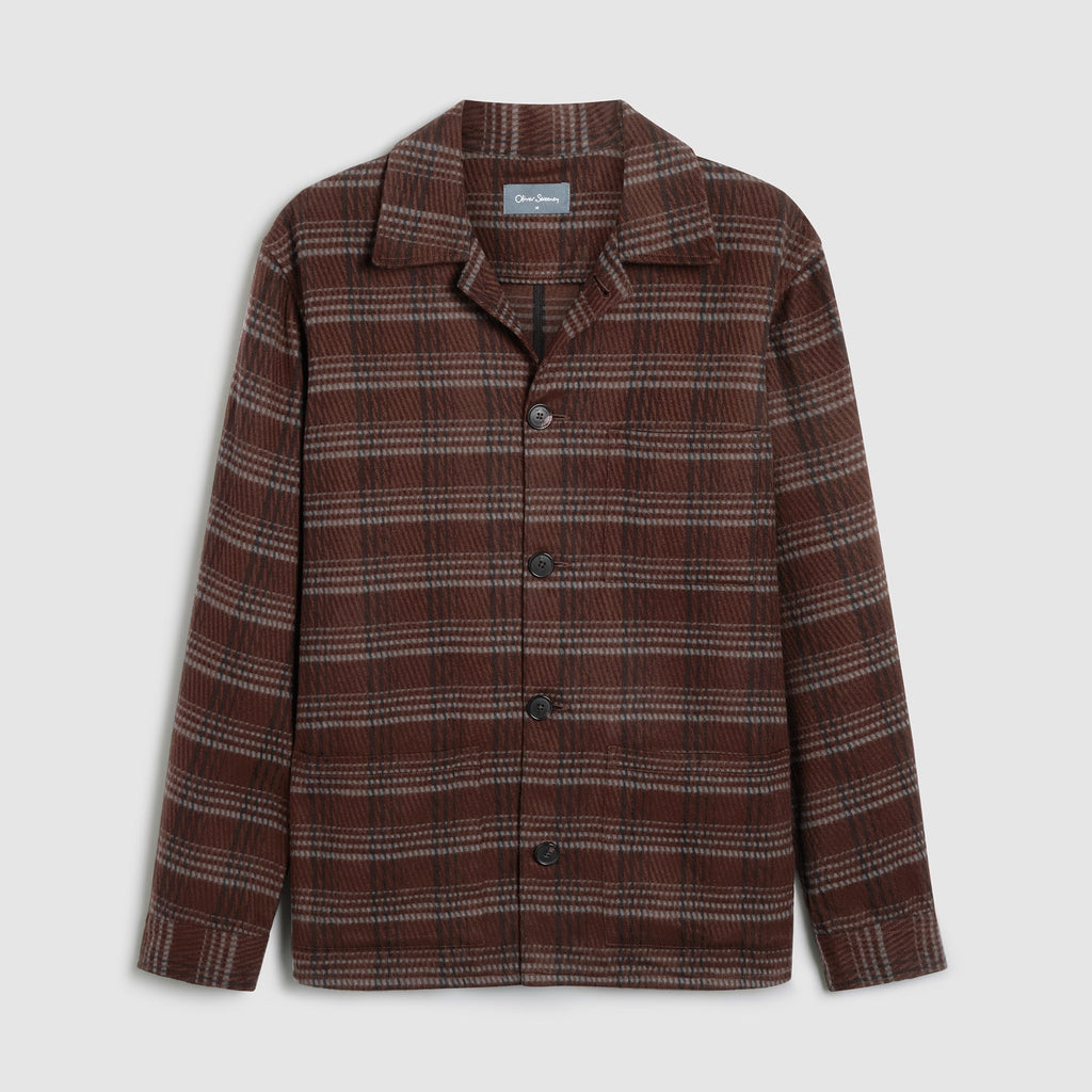 A brown and beige plaid button-up shirt jacket with a notch lapel, displayed flat against a light beige background. Oliver Sweeney Shirt Jacket available at Sakks Menswear in Southampton.
