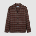 A brown and beige plaid button-up shirt jacket with a notch lapel, displayed flat against a light beige background. Oliver Sweeney Shirt Jacket available at Sakks Menswear in Southampton.