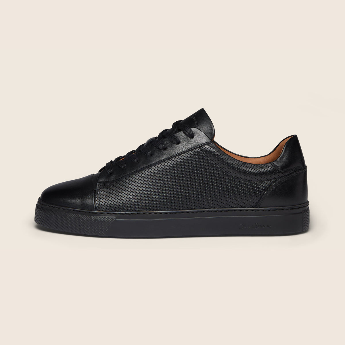 Black shoes with a white sole on a white background. Oliver Sweeney Trainers available at Sakks Menswear in Southampton.