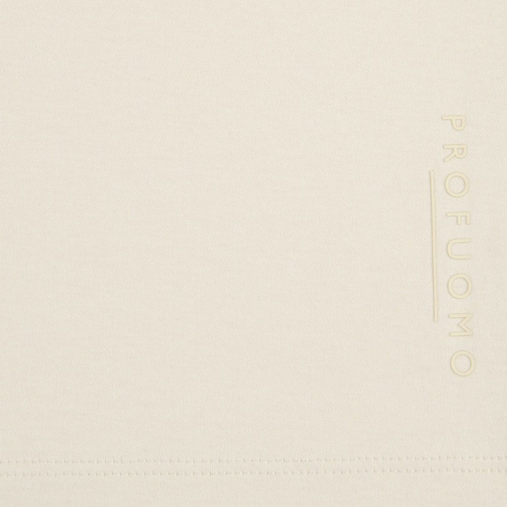 A close up image of a raw white pima cotton t-shirt with the branding spelling "PROFUOMO". Profuomo T-Shirts are available at Sakks Menswear in Southampton.