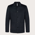 A dark navy blue wool-blend jacket with a buttoned collar, front button closure, and two front patch pockets, shown on a light beige background. Profuomo Coat available at Sakks Menswear in Southampton.