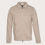 A light beige zip-up jacket with a pointed collar, two flap chest pockets, and side pockets, shown on a solid off-white background. Thomas Maine Sweats available at Sakks Menswear in Southampton.