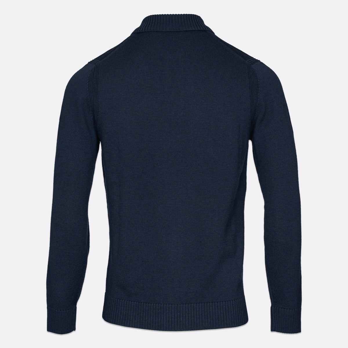 A dark navy blue knit sweater shown from the back, featuring a mock neck collar, ribbed cuffs, and a ribbed hem, displayed on a light gray background. Thomas Maine Knitwear available at Sakks Menswear in Southampton.