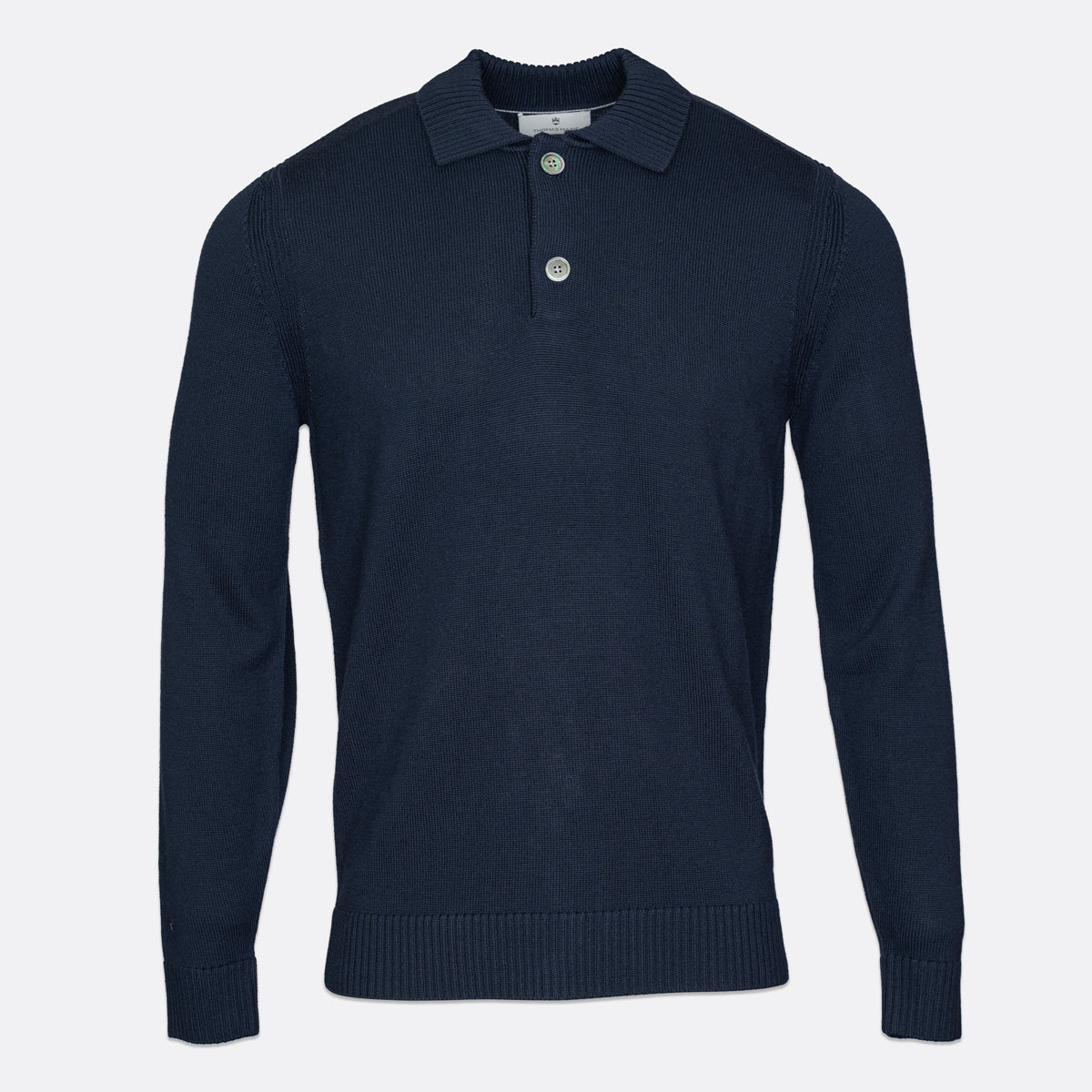 A dark navy blue long-sleeve knit polo sweater with a two-button placket, displayed on a clean, light grey background. Thomas Maine Knitwear available at Sakks Menswear in Southampton.