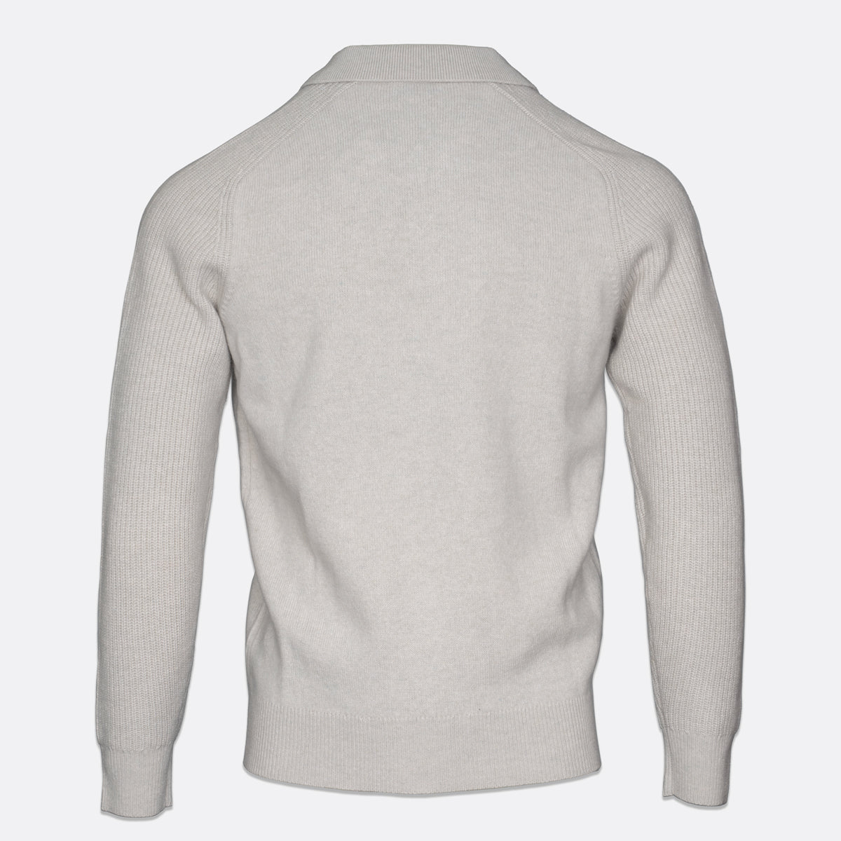 A light gray ribbed knit sweater shown from the back, featuring a classic collar and long sleeves, displayed on a clean light gray background. Thomas Maine Knitwear available at Sakks Menswear in Southampton.