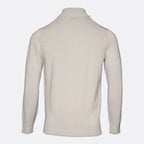 A light beige knit sweater shown from the back, featuring a mock neck collar, long sleeves, and ribbed cuffs and hem, set against a plain light gray background. Thomas Maine Knitwear available at Sakks Menswear in Southampton.