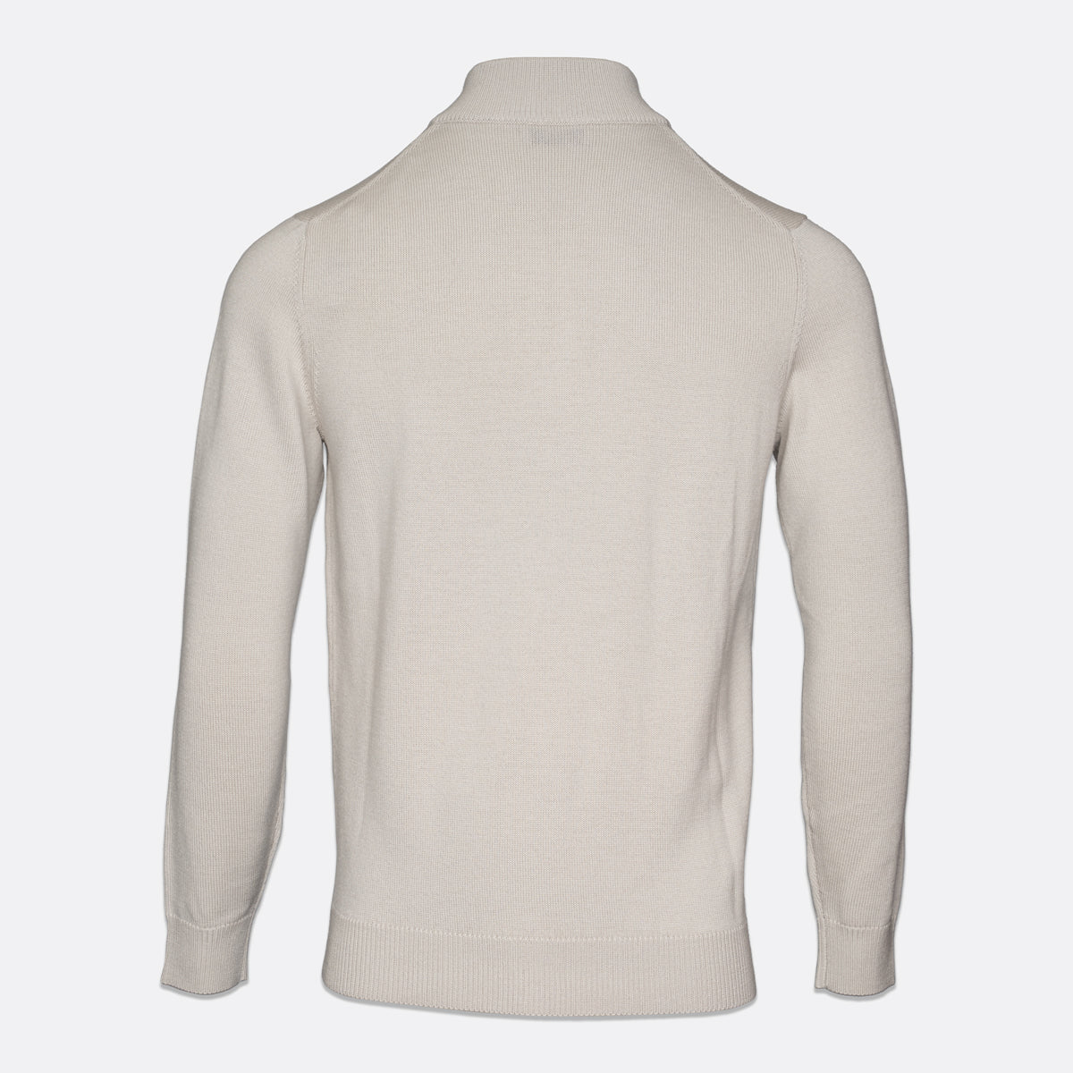 A light beige knit sweater shown from the back, featuring a mock neck collar, long sleeves, and ribbed cuffs and hem, set against a plain light gray background. Thomas Maine Knitwear available at Sakks Menswear in Southampton.