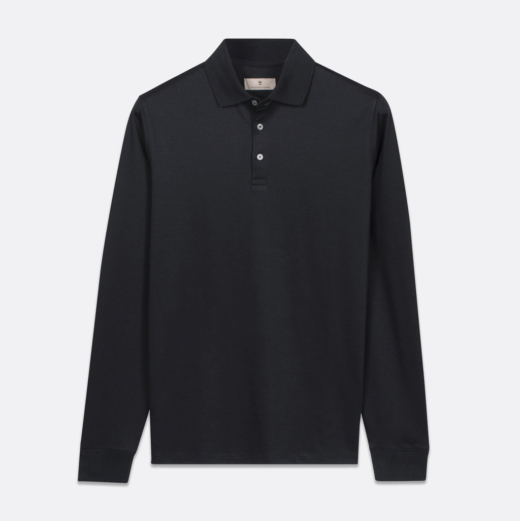 A black long-sleeve polo shirt with a three-button placket, displayed flat against a light gray background. Thomas Maine Polos available at Sakks Menswear in Southampton.