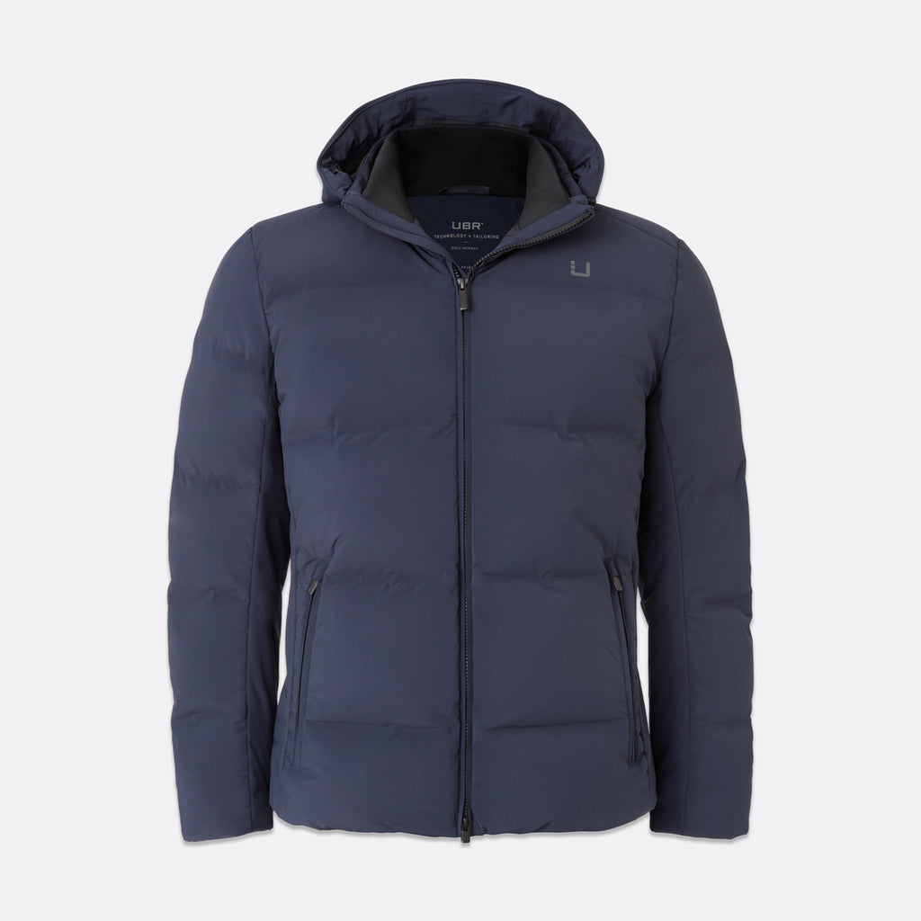 UBR Bolt Down Jacket in Navy displayed in front of a light grey background. UBR Jackets available at Sakks Menswear in Southampton.