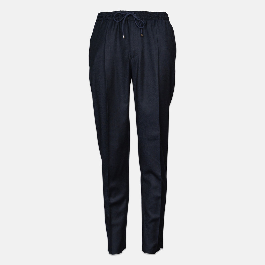 A pair of dark navy blue trousers with a drawstring waistband, shown against a plain light gray background. Briglia 1949 Trousers available at Sakks Menswear in Southampton.