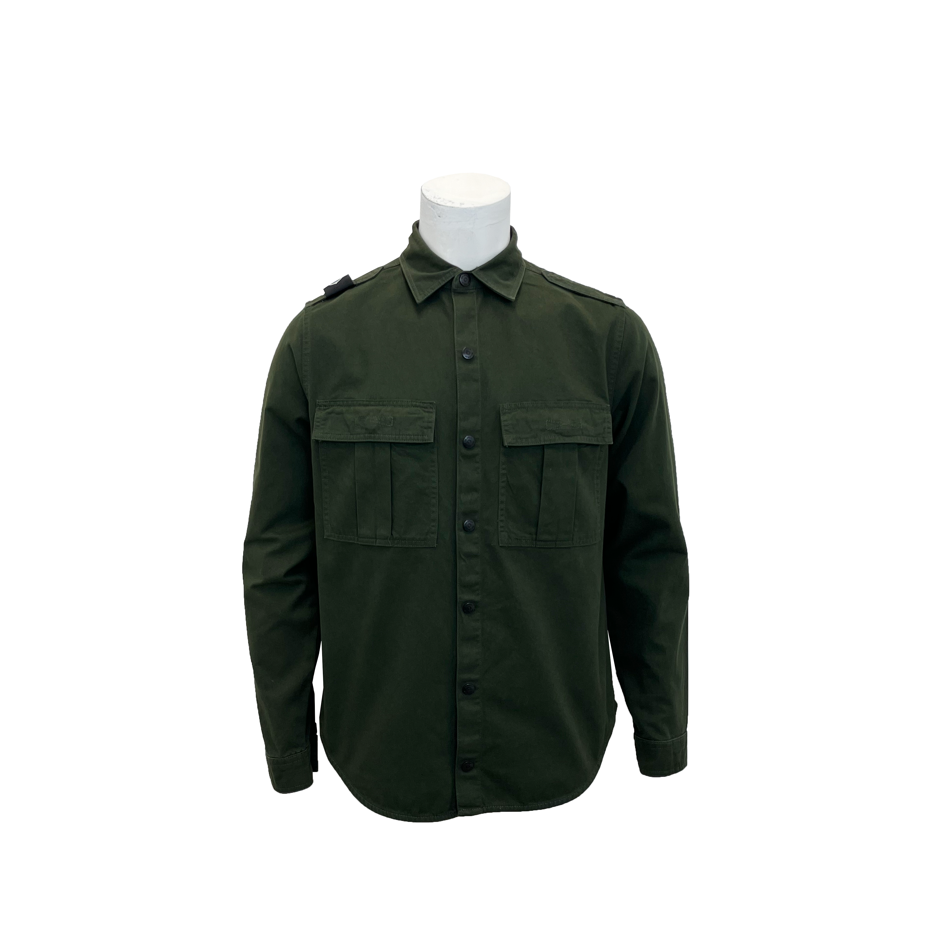 An olive green long-sleeve military-style shirt jacket with two buttoned chest pockets, displayed on a white mannequin torso against a plain white background. MA.Strum Shirt Jacket available at Sakks Menswear in Southampton.
