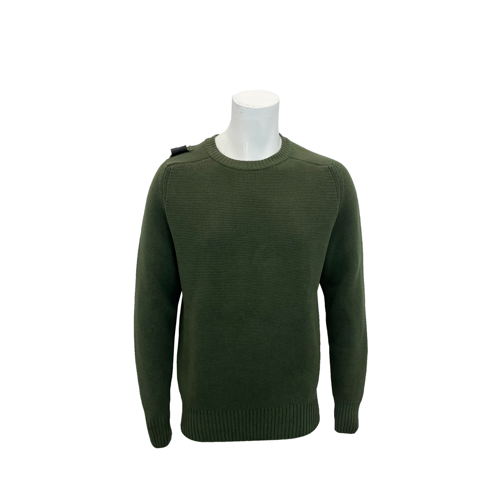 An olive green knit crewneck sweater displayed on a white mannequin torso against a plain white background. MA.Strum Jumper available at Sakks Menswear in Southampton.