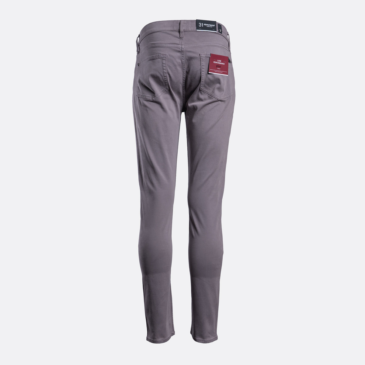 Gray slim-fit pants shown from the back, featuring a red brand patch on the back right pocket and a black waistband label. 7 For All Mankind Chinos available at Sakks Menswear in Southampton.